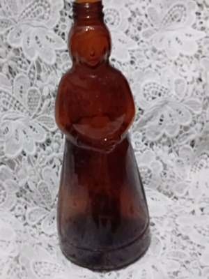 Vintage collectible bottle new, colored female figure