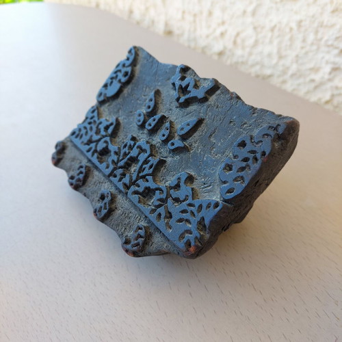Vintage wooden carved fabric printing stamp used