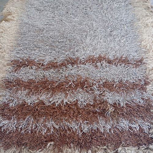 Handmade rug with leather, beige and brown