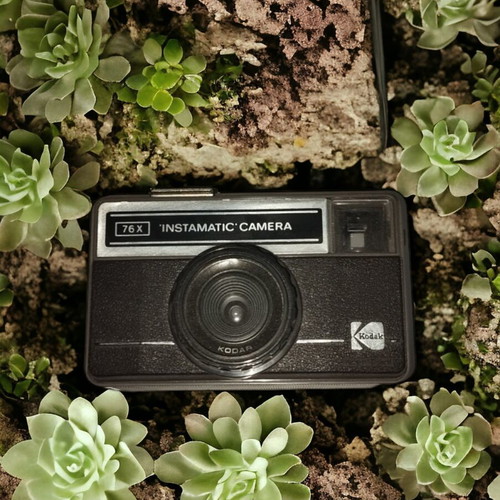 Kodak Instamatic 77x used photo camera with leather case