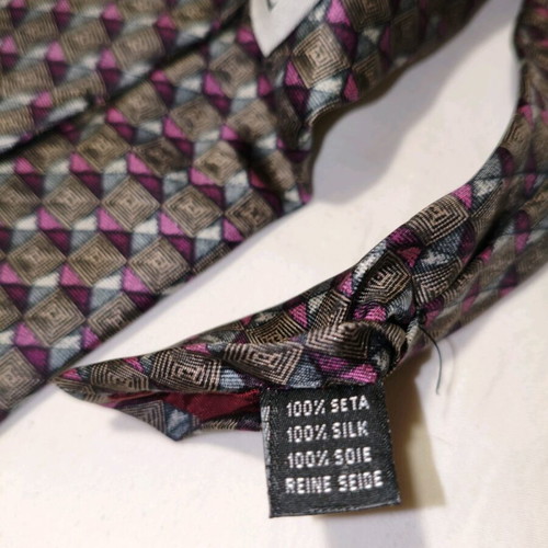 Vogue silk tie used with geometric pattern in brown and purple
