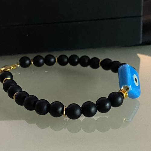 Handmade bracelet with haolite semi-precious stones and ceramic eye motif