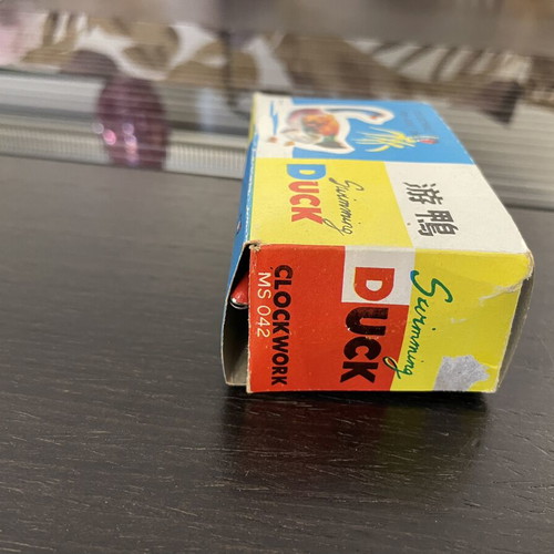 Tin duck vintage toy used with original box, Chinese made