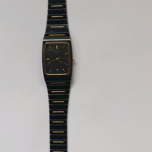 Seiko 2A32-5059 wristwatch used with black bracelet