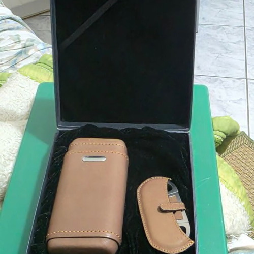 Luxury cigar accessory set with leather case and cutter