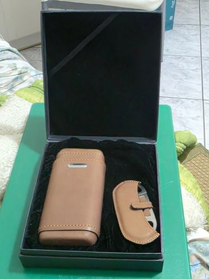 Luxury cigar accessory set with leather case and cutter