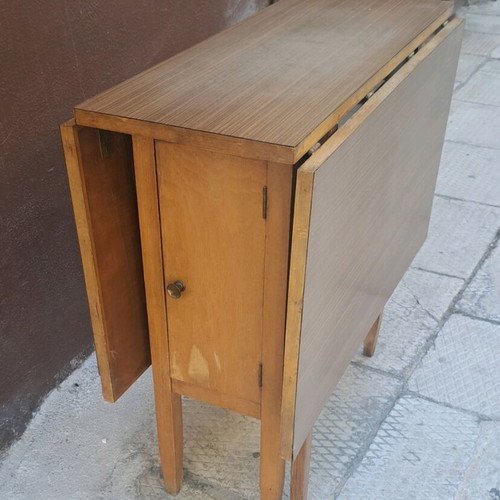 Dining table used with 2 drop-leaves and cabinet with shelf