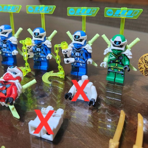 Lego Ninjago figures used with weapons
