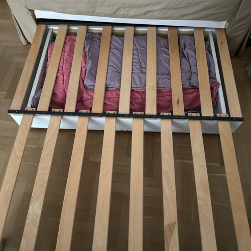 Beige two-seater sofa bed like new with storage space