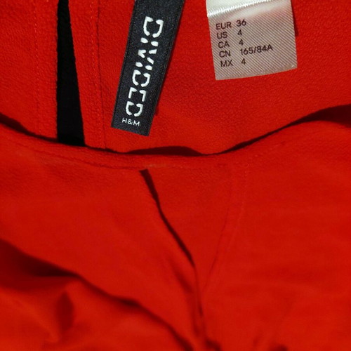 H&M red top like new with knot and elastic waist