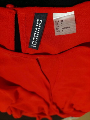 H&M red top like new with knot and elastic waist