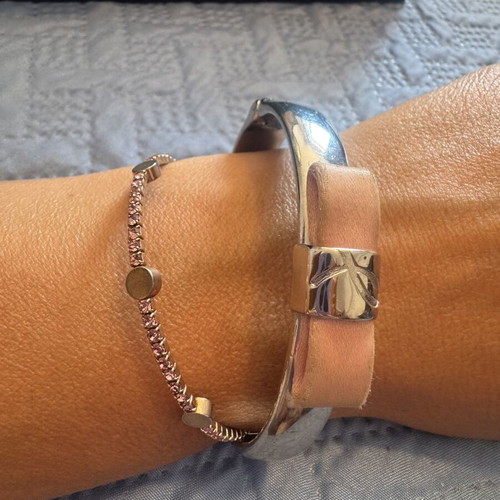 Bracelets pack of two, one collectible pink ribbon, used