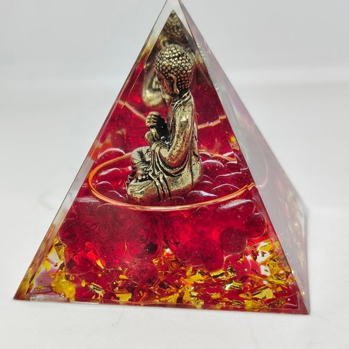 Orgonite pyramid with Buddha and red quartz like new