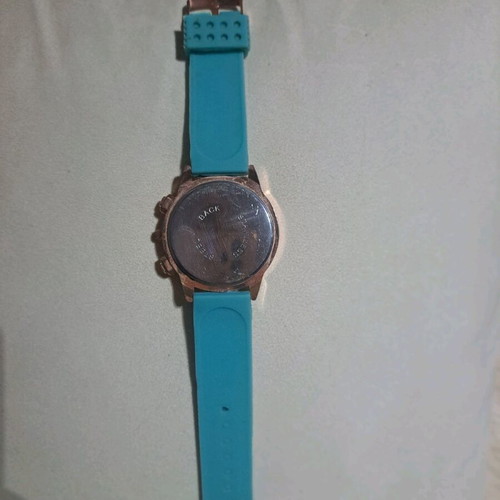 Women's watch used, rose gold with turquoise rubber strap