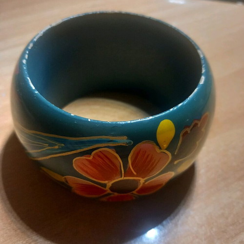 Wooden bracelet used with painted design