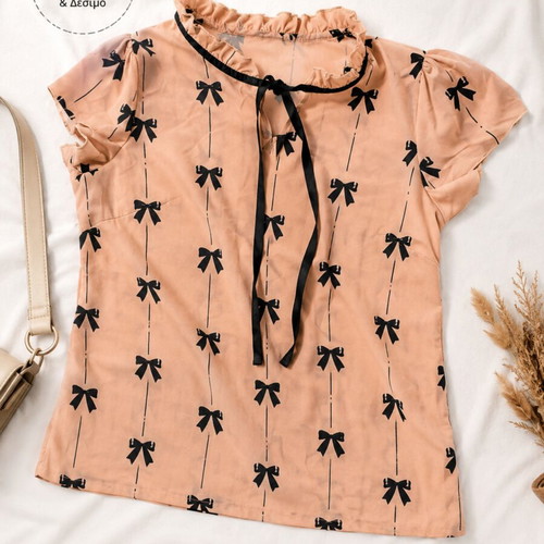 Peach women's blouse with black bows and tie like new, Parisian