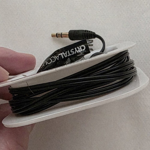 Crystal Acoustics wired in-ear headphones with extra ear tips and case