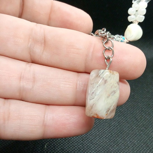 Necklace with colorful beads and moss agate semiprecious stone