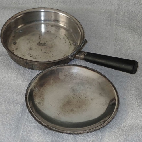 Antique heating vessel used for bed
