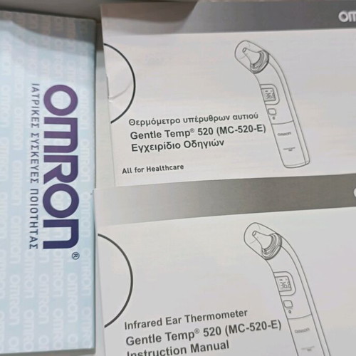 Omron Gentle Temp 520 infrared ear thermometer like new with 14 probe covers