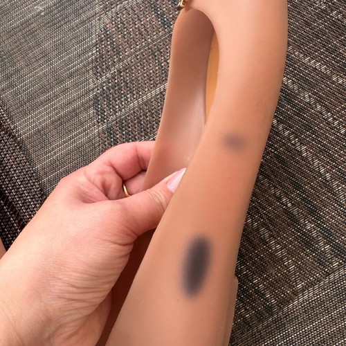 Ballerina shoes used with ink mark on one shoe