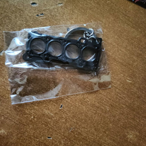 Keychain new in gasket shape black