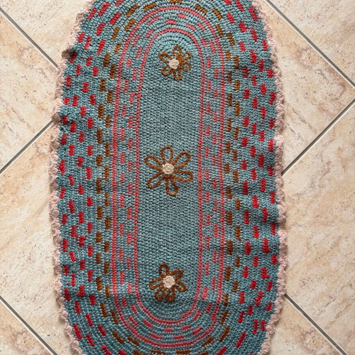 Handmade knitted rug used