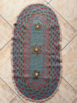 Handmade knitted rug used