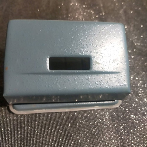 Hole punch used, gray