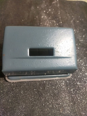 Hole punch used, gray
