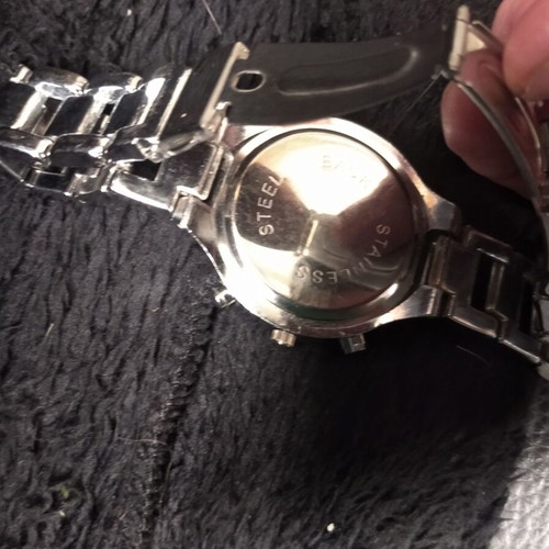 Women's wristwatch new silver with round dial and rhinestones