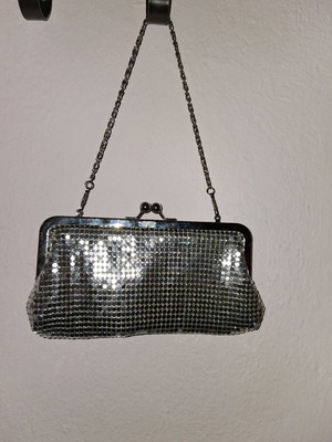 Small silver evening clutch bag used