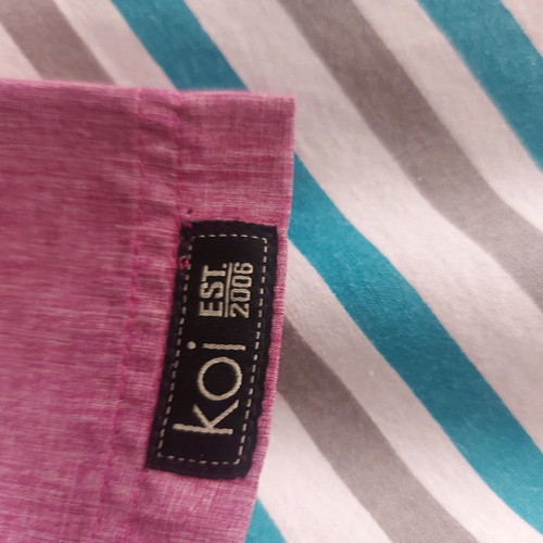 Koi nursing scrub new unworn, size S, rotten apple color