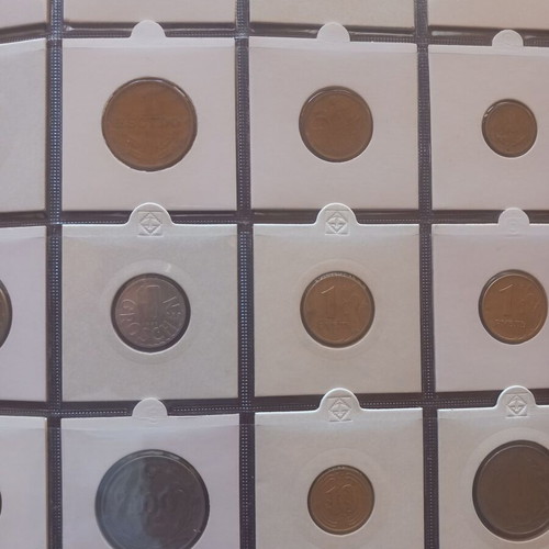 World coin lot used, 100 different coins in soft album