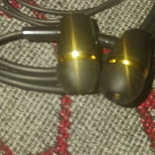 Wired black and gold earphones with 3.5 mm jack