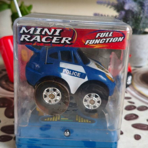 Electric toy cars with controllers, red and blue, sealed set of 2