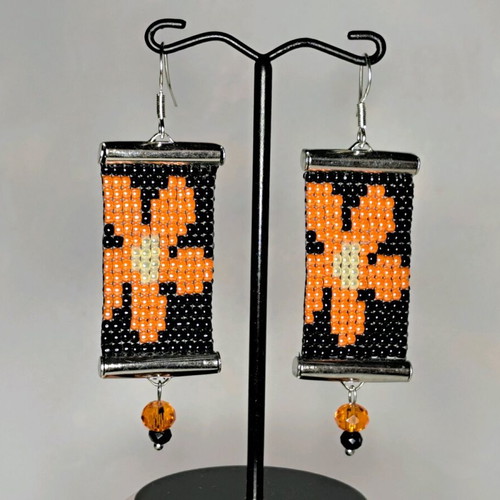 Handmade earrings new with daisies, knitted, black and orange