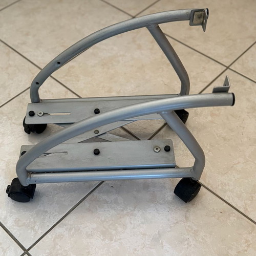 Metal computer tower stand used with wheels
