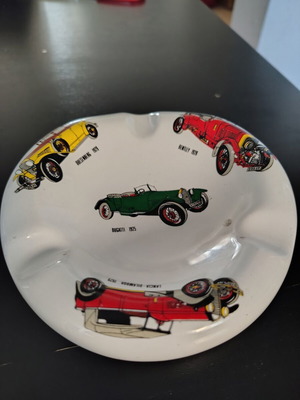 Ceramic ashtray used with vintage car designs