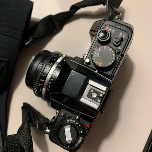 Nikon F-301 with nikkor 50mm 1:1.8 lens and HoyaHMC filter like new