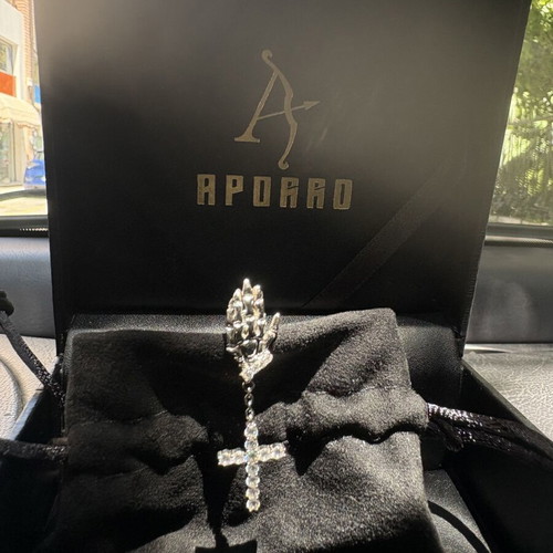 Aporro cross skeleton earring like new