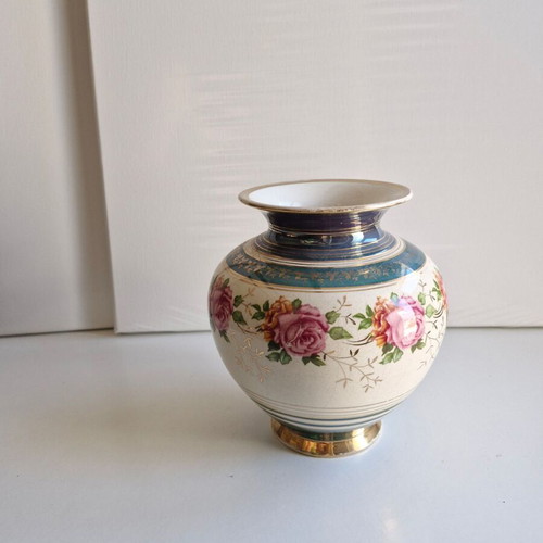 Vintage vase with floral decorative elements, like new