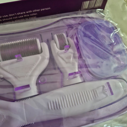 DRS 6 in 1 Derma Roller System microneedling set, new sealed