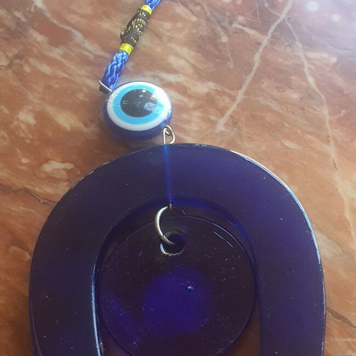 Gouri horseshoe with evil eye charm