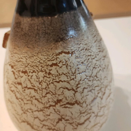 Clay vase like new with embossed flowers 0.14 height