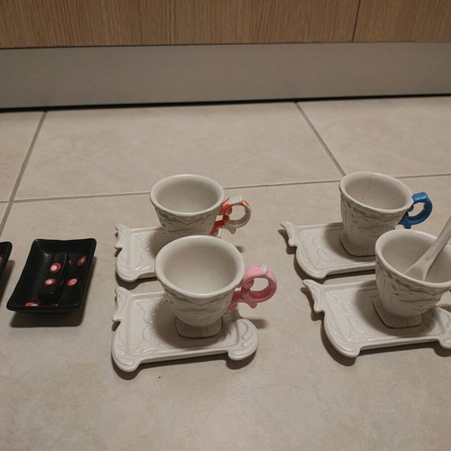 Porcelain glasses used, one slightly broken