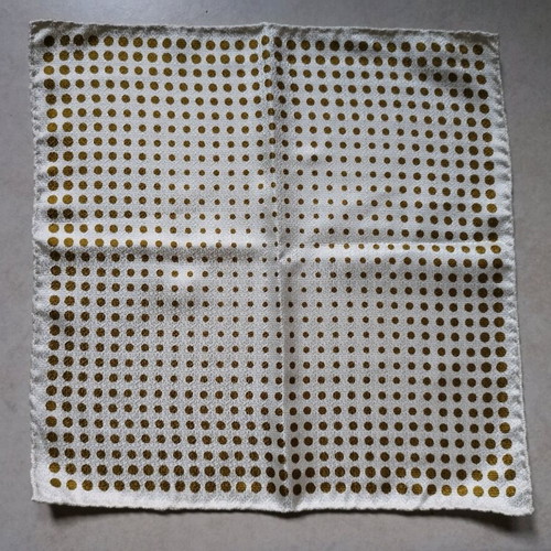Pocket square used, white with gold dots