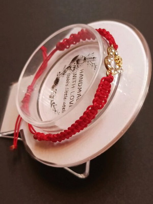 Bracelet with red thread and heart ornament new