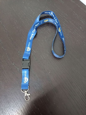 More Than A Port key lanyard used, blue and yellow