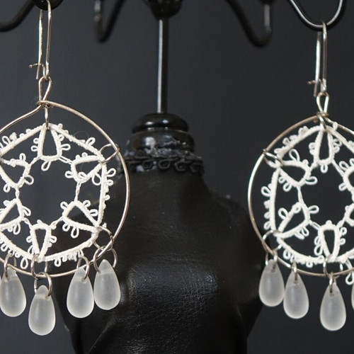 Handmade earrings with intricate design, new, white